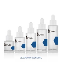 Flacon compte-gouttes rond en verre blanc givré de 20ml 30ml 50ml 60ml 80ml Flacon compte-gouttes cosmétique d'huile capillaire d'huile pour le corps avec boîte en papier