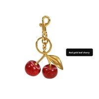 Kersen fruit sleutelhanger tasbedel schouderband verlenger verlengstuk crossbody accessoire met parelketting