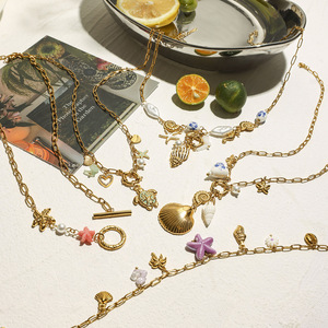 Conjunto de collar de acero inoxidable chapado en oro de 18 quilates estilo Ocean Resort con dijes de estrella y corazón para mujer, joyería de moda. - Product Image 3
