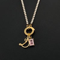 eManco Breloque Lettre Cursive Plaqué Or avec Cristal Rose Carré Amovible, Bijou DIY Multi-Breloques Pierre de Naissance