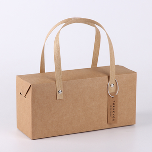 Long Eco-Friendly High-End Kraft Paper Handle Gift Box Thick Cardboard Fixed Metal Rivets Die Cut Design Four-Color Printing - Product Image 1