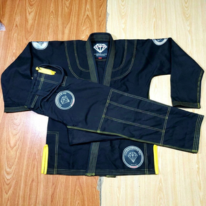 Kimono de Jiu Jitsu Brasileño 100% Algodón, Tejido Perla, 460g, Bordado e Impreso, Ropa Deportiva Personalizada para Judo, BJJ y Artes Marciales - Product Image 1