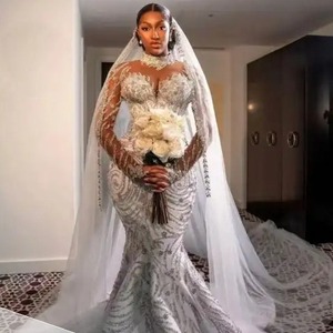 Nouvelle Robe de Mariée Style Africain pour le Commerce International, Robe de Mariée Sirène à Manches Longues et Col en V Profond en Dentelle, Vente en Gros - Product Image 1