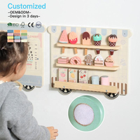 Tableau d'activités Montessori en bois, train de jeu, cuisine, activité sensorielle murale, cuisinière, jouet éducatif pour enfants OEM ODM