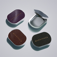Baume à lèvres blush personnalisé étui à parfum miroir solide boîte en alliage de zinc logo en relief personnalisé dessus en cuir emballage cosmétique utilisation de shampooing