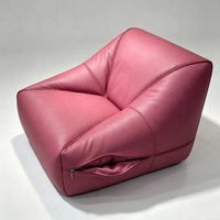 Chaise longue de sol rose unie en métal sans cadre, design ergonomique doux, housse amovible et lavable, chaise de loisirs moderne pour salon