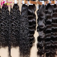 Entrepôt américain Paquet de cheveux alignés avec cuticules vierges Armure de cheveux humains de vison Vague bouclée Vente en gros de cheveux humains vierges brésiliens bruts Vedor