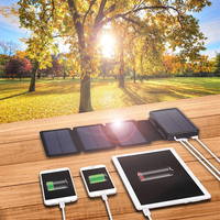 Power Bank Tenaga Surya Kapasitas Tinggi 30000mAh dengan Empat Panel Surya, Senter LED, dan Kompas untuk Berkemah di Luar Ruangan