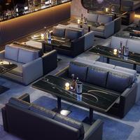 Mobilier personnalisé de luxe léger pour discothèque Table et chaises de bar Tabourets commerciaux pour restaurant