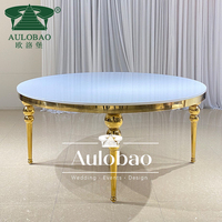 Table de réception ronde de luxe moderne en acier inoxydable blanc pour extérieur, idéale pour les banquets d'hôtel et les mariages