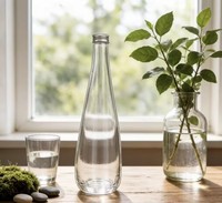 Bouteille en verre ronde transparente simple de 520 ml avec couvercle, étiquette scellée pour les boissons, la bière, le vin, le jus, réutilisable, durable, respectueuse de l'environnement