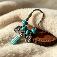 Porte-clés Bohème Western Cowgirl avec pompon perlé turquoise, breloques en métal (cactus, botte de cheval) et mousqueton pour sac