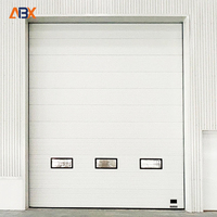 Porte sectionnelle industrielle motorisée avec batterie de secours, acier galvanisé double couche, isolation thermique élevée