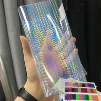 Prix usine A4 Transparent arc-en-ciel holographique photographique Film de stratification à froid Surface brillante BOPP étanche à l'humidité 30cm de largeur