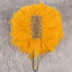 11 couleurs disponibles en stock, éventails à main en plumes de dinde nigériane teintes pour la décoration de mariage - Product Image 1