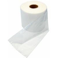 Rouleau de sacs en polyéthylène (PE) transparents de qualité alimentaire pour l'emballage continu sous vide des légumes et fruits, idéal pour les supermarchés et les épiceries.