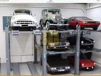Pont élévateur automobile 4 poteaux haute capacité 6,3 tonnes à double vérins hydrauliques certifié CE pour le stockage de véhicules