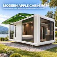 Maisonnette préfabriquée intégrée en une seule pièce, type Apple Cabin, avec verrière panoramique et auvent rétractable pour complexe hôtelier ou camping