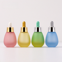 Vente en gros de flacons compte-gouttes en verre transparent/coloré de 30 ml, flacon vide pour huile essentielle avec bouchon compte-gouttes pour usage cosmétique