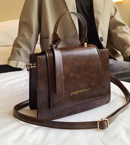 Sac à main de luxe pour femmes, sac à bandoulière élégant et mignon en cuir PU bicolore, style ethnique - Product Image 1