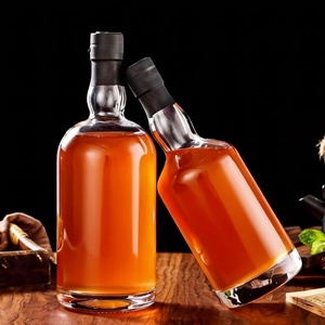 Botella de Vidrio Redonda de 750 ml (25 oz) para Ron, Whisky, Vodka, Ginebra y Licores, con Cápsula - Product Image 1