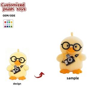 Peluche de canard <span class=keywords><strong>photographe</strong></span> personnalisée OEM/ODM - Adorable canard jaune en peluche avec lunettes <span class=keywords><strong>et</strong></span> accessoire appareil photo - Product Image 1