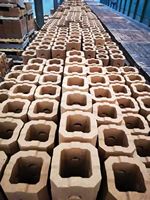 Briques réfractaires en magnésie à base de fer, teneur en MgO 85-88%, réfractaire moyen (1580-1770°C), marque HCR pour four rotatif à ciment