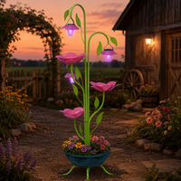 Support de jardinière multi-lumières solaire léger et écologique en fer thermolaqué avec base en forme de feuille pour la décoration de jardin, patio et cour