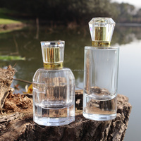 Flacon de parfum cylindrique transparent de luxe classique 30 ml, imprimé sérigraphié, en verre vide rechargeable avec pulvérisateur à pompe pour diffuseur à bâtonnets
