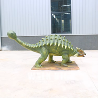 Sculpture de dinosaure animatronique de haute qualité en fibre de verre verte avec fonction résistante aux intempéries pour une utilisation en intérieur/extérieur