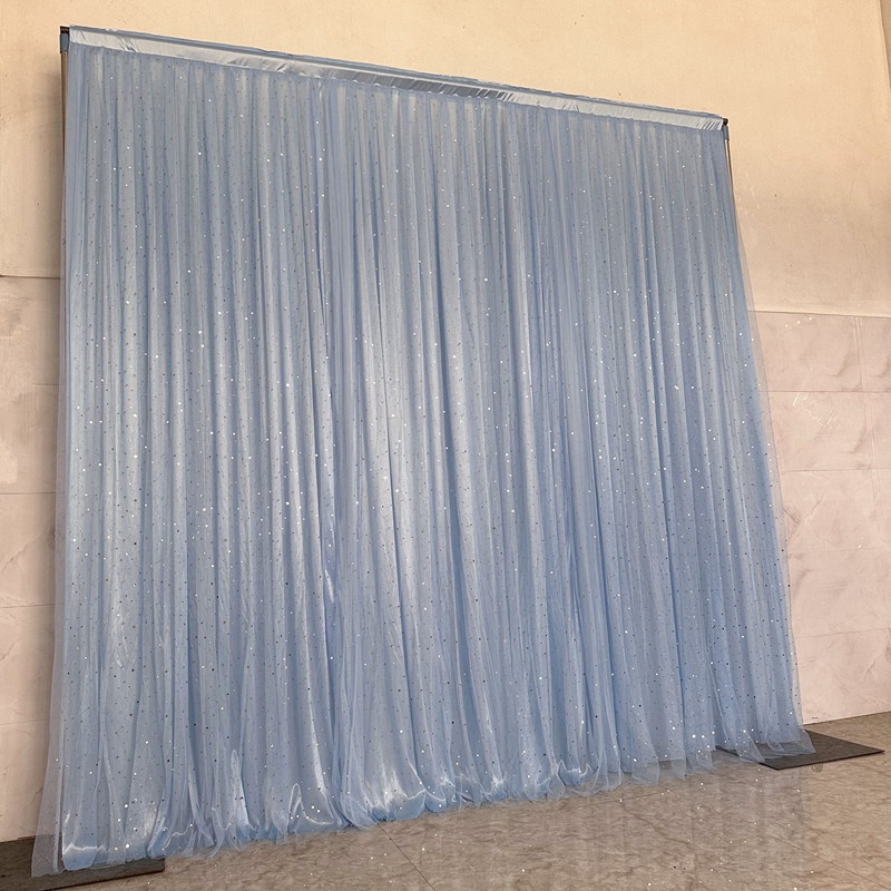 drapé en soie glacée bleu clair + tulle bleu clair