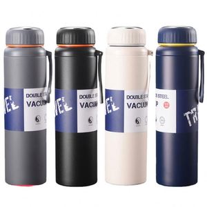Botella de Agua Deportiva de Acero Inoxidable de Doble Pared y Boca Ancha de 32 oz con Tapa de Nuevo Diseño, Ideal para Deportes, con Filtro para Té - Product Image 1