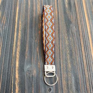 Stock Available Now National Wind Plush Embroidery Keychain Ethnic Style Handmade Wristband Retro Long Pendant - Product Image 6