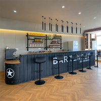 Comptoir de bar commercial en fer bleu sur mesure avec extérieur de conteneur moderne et bande lumineuse pour projets de cafés et d'hôtels