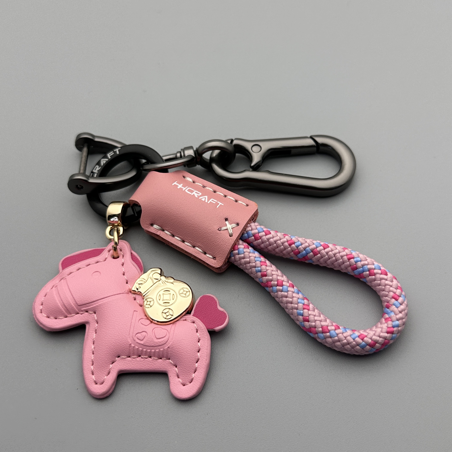 Piel rosa, cuerda rosa, hebilla de ocho caracteres de pony rosa