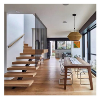 Escalier flottant droit en bois massif et acier pour intérieur, style industriel, marches fermées en métal, éclairage LED, verre, moderne, pour hôtel et villa