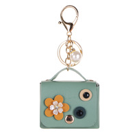 Breloque de sac mini floral, porte-clés, décor floral 3D, petit pendentif de sac à main avec perle, pochette de rangement pour Airpods, décoration de sac pour femme, cadeau