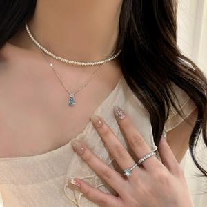 สร้อยคอเงินแท้ S925 ดีไซน์หรูหรา ประดับด้วยพลอยแซฟไฟร์ทรงรีสีขาวทอง พร้อมจี้รูปไข่นกพิราบ - Product Image 4