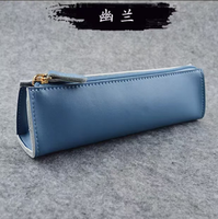 Étui à crayons cylindrique en cuir PU de couleur unie minimaliste, fermeture éclair imperméable, pochette à stylos portable, papeterie pour étudiants et professionnels