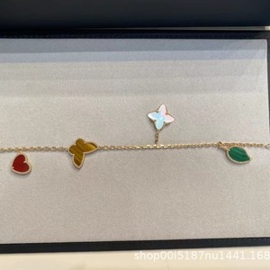 Nuevo y de Alta Calidad, Chapado en <span class=keywords><strong>Oro</strong></span> de 18K sobre Acero Inoxidable, Diseño Retro con Mariposa Azul de la Suerte, Trébol de Cuatro Hojas y Patrón de Planta, Unisex - Product Image 5