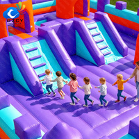 Aire de jeux gonflable sur le thème des champignons pour enfants avec toboggan et parcours d'obstacles pour location commerciale, parcs et événements