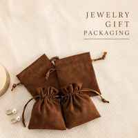 Pochette élégante en velours suédé avec cordon de serrage, personnalisable avec logo imprimé, petite pochette anti-poussière pour bijoux, vente en gros d'usine, respectueuse de l'environnement