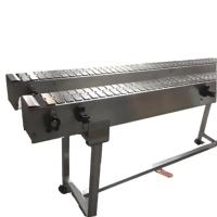 Ligne de production automatique de convoyeur à chaîne à dessus de table plat pour l'emballage industriel