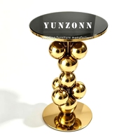 Table de cocktail moderne en verre noir avec structure en acier inoxydable doré pour mobilier d'événements hôteliers, approvisionnement en gros
