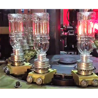 Ligne de production de bouteilles d'eau minérale en plastique soufflé entièrement automatique à grande vitesse, machine de soufflage de préformes en PET