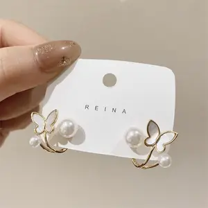 Pendientes De Perlas estilo coreano mariposa esmalte blanco pendientes temperamento mujeres mariposa Stud pendientes