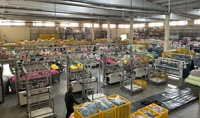 Ligne de production de couture entièrement automatique pour tissus en microfibre/argent