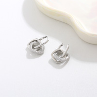 Boucles d'oreilles KAVNAR Huggie en laiton plaqué or blanc, tige en argent 925, zircone cubique entrelacée pour femmes