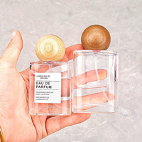 Bouteilles en verre transparentes de 30 ml et 50 ml, forme sphérique plate, avec buse en aluminium portable et bouchon à vis, design de pulvérisation sous pression rechargeable