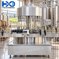 Automatische vloeistofvulmachine, roterende laagvacuüm flesvuller voor druivenwijn, sap, dranken, glazen verpakkingen, leveranciersysteem